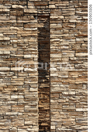 Image of a natural stone brick wall 130903806