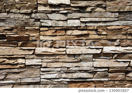 Image of a natural stone brick wall 130903807