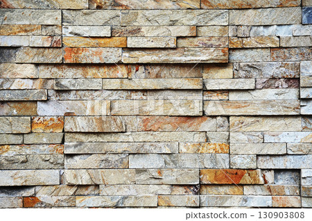 Image of a natural stone brick wall 130903808