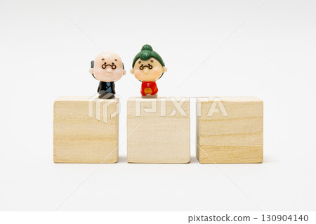 Senior couple and three letter blocks Senior couple and three letter blocks 130904140