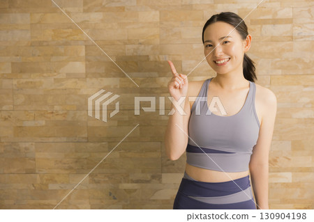 A woman who plays hot yoga 130904198