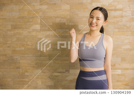 A woman who plays hot yoga A woman who plays hot yoga 130904199