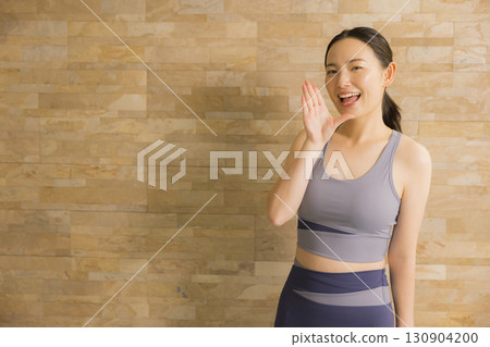 A woman who plays hot yoga A woman who plays hot yoga 130904200