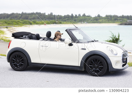 Cute woman driving 130904223