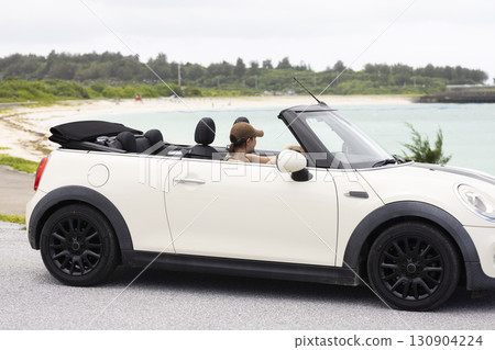 Cute woman driving 130904224