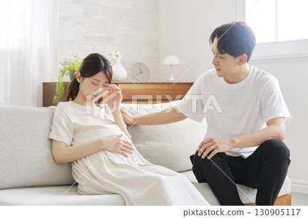 Pregnant woman headache at home 130905117