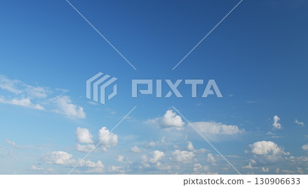 An absolutely Beautiful and Clear Blue Sky adorned with Fluffy and Dreamy White Clouds An absolutely Beautiful and Clear Blue Sky adorned with Fluffy and Dreamy White Clouds 130906633