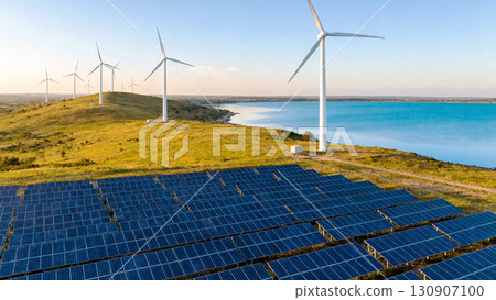 Clean Energy Landscape with Wind Turbines and Solar Panels by the Lake 130907100