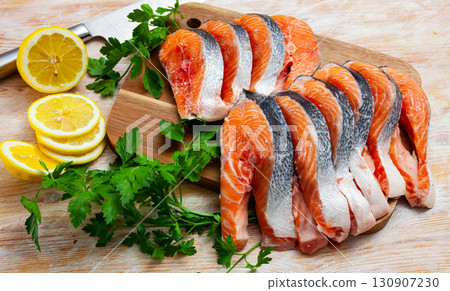 Raw seafood, fresh fillet salmon fish on board 130907230