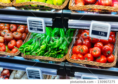 Counter with large assortment of fresh vegetables Counter with large assortment of fresh vegetables 130907275