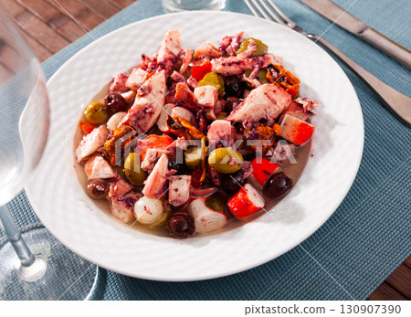 Popular Spanish Salpicon from vegetables and seafood mix 130907390