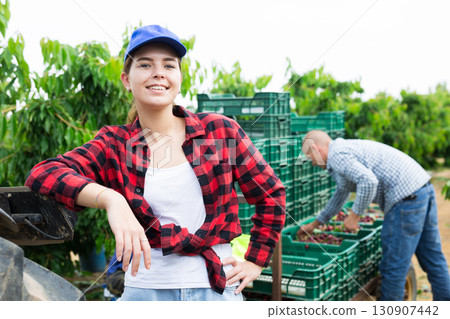 Portrait of a positive young girl farmer 130907442