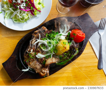 Rustic style grilled veal with potato and vegetables Rustic style grilled veal with potato and vegetables 130907633