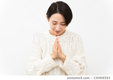 Woman wearing white knitwear Lifestyle image 130908563