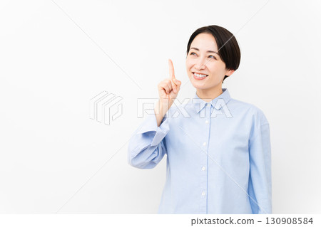 Woman wearing a long-sleeved shirt Woman wearing a long-sleeved shirt 130908584