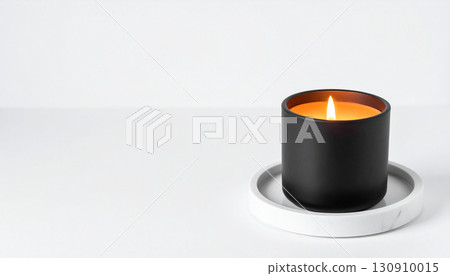 Matte Black Candle with Orange Flame on Marble Tray. Hallowen Concept. Generated Image 130910015