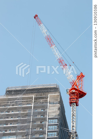 Crane at condominium construction site Crane at condominium construction site 130910386