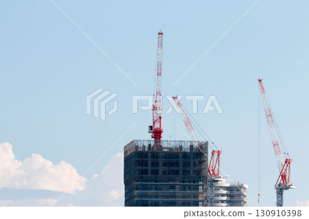 Crane at condominium construction site Crane at condominium construction site 130910398