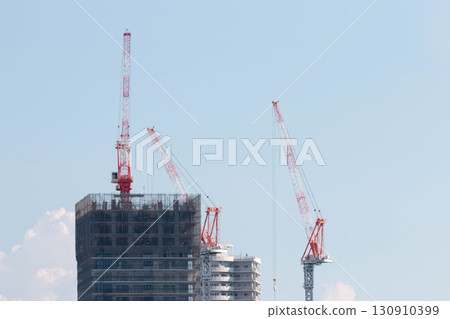 Crane at condominium construction site Crane at condominium construction site 130910399