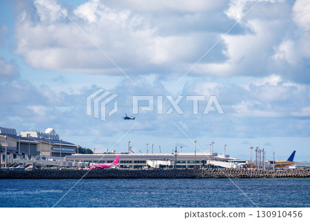 Passenger planes taking off and landing at Naha Airport. Kerama Islands, Shimajiri District, Okinawa Prefecture - June 27, 2025. Heading to Zamami Island and other islands in the Kerama Islands. 130910456