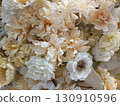 Elegant and pretty artificial flowers in white and beige 130910596