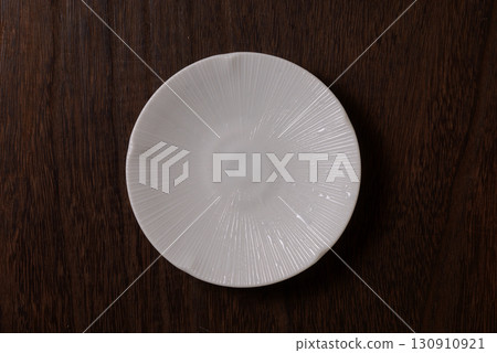 Japanese plate seen from directly above - background material Japanese plate seen from directly above - background material 130910921