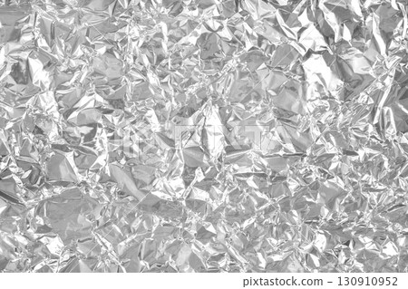Silver foil leaf shiny texture, abstract grey wrapping paper for background and design art work. 130910952