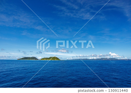 The Kerama Islands came into view. Kerama Islands, Shimajiri District, Okinawa Prefecture - June 27, 2025. We boarded the Queen Zamami 3. The Kerama Islands came into view. Kerama Islands, Shimajiri District, Okinawa Prefecture - June 27, 2025. We boarded the Queen Zamami 3. 130911440