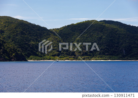 Entering the Kerama Islands. Yachts and boats. Kerama Islands, Shimajiri District, Okinawa Prefecture - June 27, 2025, on the Queen Zamami 3. 130911471