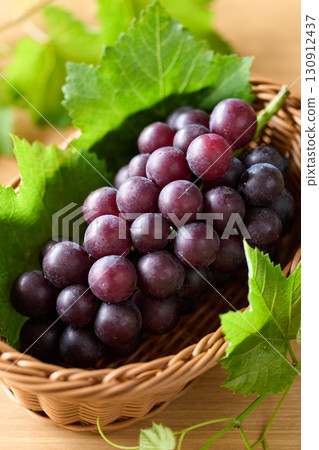 Kyoho grapes in a basket 130912437