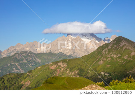 Cloud on a Snowy Peak in the Dolomites 130912990