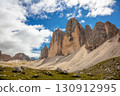 Tre Cime di Lavaredo in Sunshine and Light Clouds 130912995