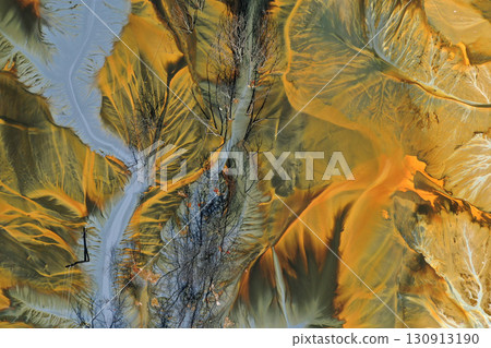 Aerial view of acid mine water drainage flow, toxic mine waters polluting the environment Aerial view of acid mine water drainage flow, toxic mine waters polluting the environment 130913190