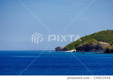 Aka Island, Zamami Island, the uninhabited island of Kabi Island, and Agenashiki Island are visible. Kerama Islands, Shimajiri District, Okinawa Prefecture. Aboard Queen Zamami 3. Aka Island, Zamami Island, the uninhabited island of Kabi Island, and Agenashiki Island are visible. Kerama Islands, Shimajiri District, Okinawa Prefecture. Aboard Queen Zamami 3. 130913458