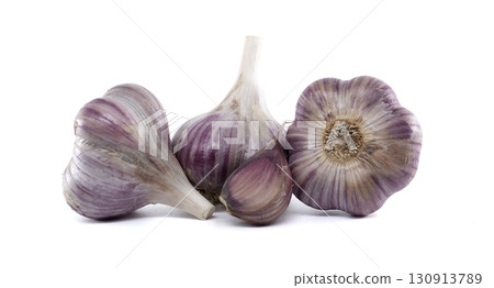 A collection of fresh purple garlic bulbs on a bright white background, perfect for culinary use. A collection of fresh purple garlic bulbs on a bright white background, perfect for culinary use. 130913789