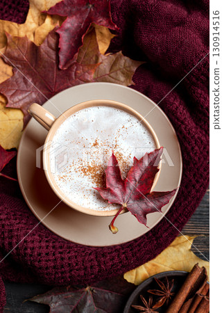Cozy autumn composition with coffee, plaid and maple leaves 130914516