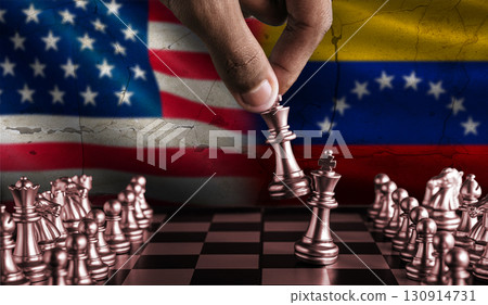 Political tension between Venezuela and USA. Venezuela vs USA flag on chessboard Political tension between Venezuela and USA. Venezuela vs USA flag on chessboard 130914731