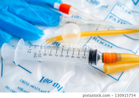 Foley catheter and urine drainage bag collect urine for disability or patient in hospital. 130915754
