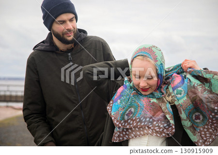 Walking lovers man and woman outdoors portrait 130915909