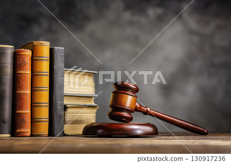 Judge's gavel and antique books 130917236