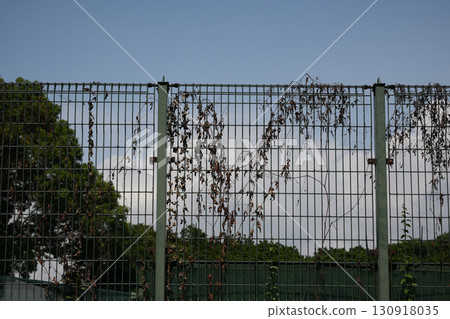Tennis court security fence 130918035