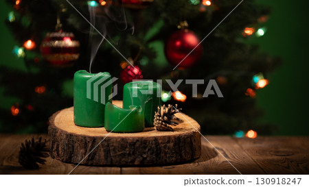 Celebrating Christmas and New Year With Candles and Festive Decorations on a Wooden Surface 130918247