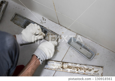 Drain pipe in bathroom close up 130918561