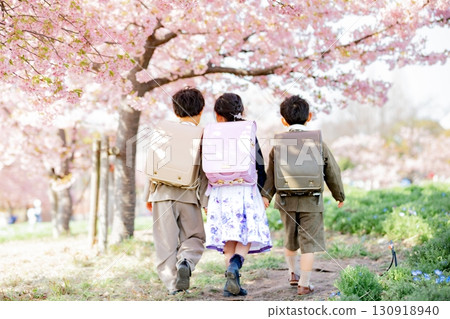 Image of three good friends entering school 130918940