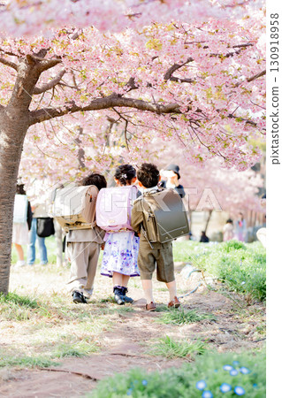 Image of three good friends entering school 130918958