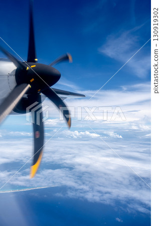 Aerial view of the Pacific Ocean with a spinning propeller 130919302