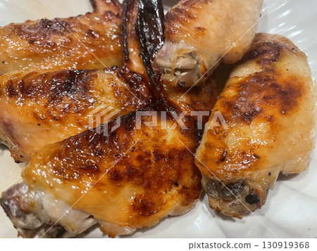 Appetizingly browned homemade oven-baked chicken wings3 130919368