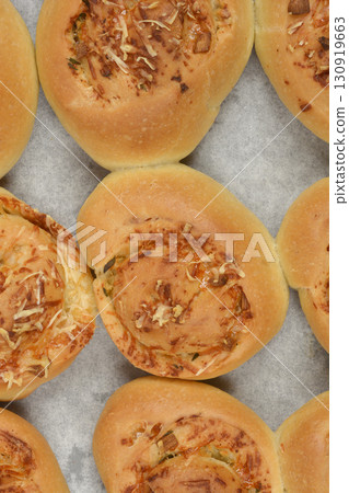 Baked rolls with garlic and parmesan Baked rolls with garlic and parmesan 130919663