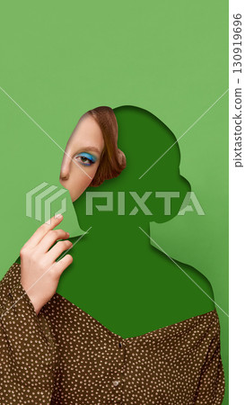 Digital artwork. Surreal faceless woman with partial portrait and hand gesture on green background 130919696