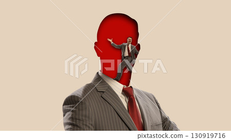 Creative collage. Businessman silhouette with smaller figure performing inside head space Creative collage. Businessman silhouette with smaller figure performing inside head space 130919716